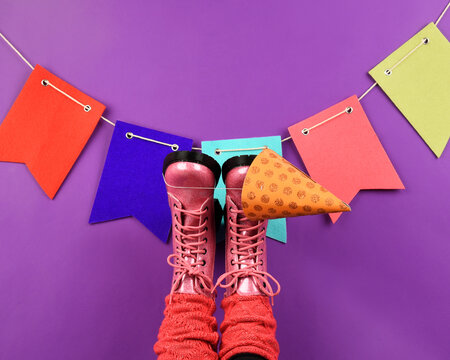 Pink Fashion Boots Against Party Wall