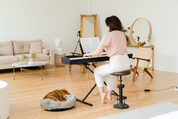 Pianist playing at home