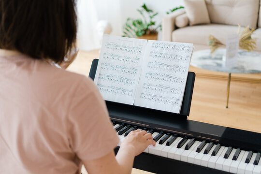 Pianist playing at home