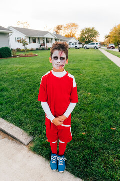 9-year-old Child proudly showing off his Halloween costume. 
