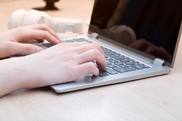 A man is working with a laptop.Working with a laptop at home.