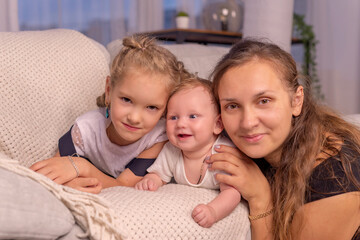 happy family together at home. mom and baby. family portrait