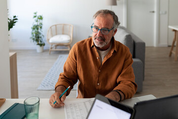 Mature man working at home