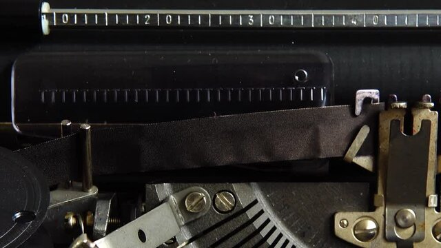 Details of an old retro typewriter, vintage style. Old typewriter hammers. Close up.
