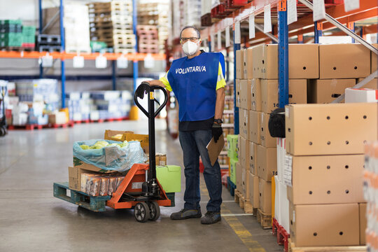 Portrait of a hispanic man volunteer