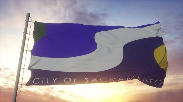 Sacramento city flag waving in the wind, sky and sun background