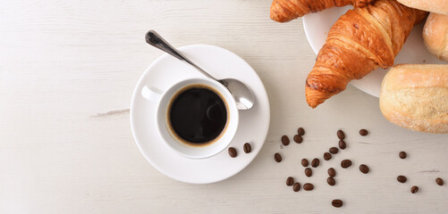 Background with breakfast table with coffee and pastries top