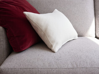 Soft cushions on gray couch