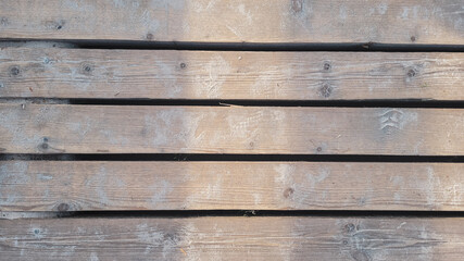 Fototapeta premium Wooden boards at the pier on the beach