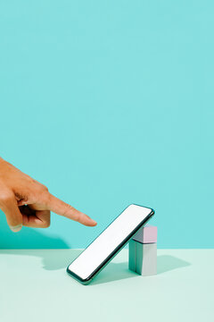 man about to touch a smartphone