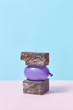 Balloon between stones