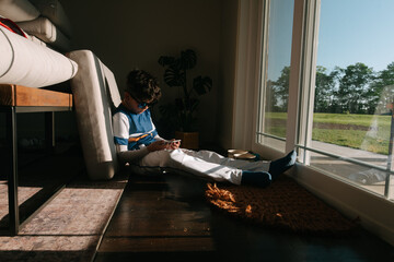 Boy dressed in uniform ready for baseball game. 