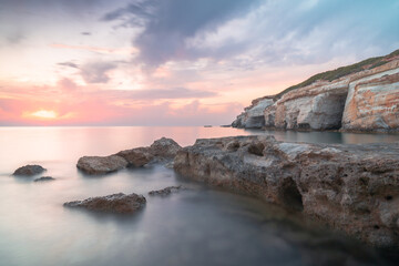 Sunset over the sea caves