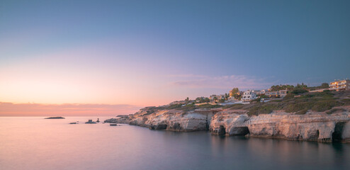 Sunset over the sea caves