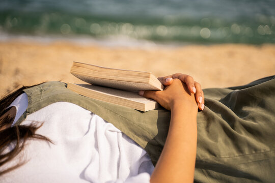 Beautiful young woman relaxing at beach