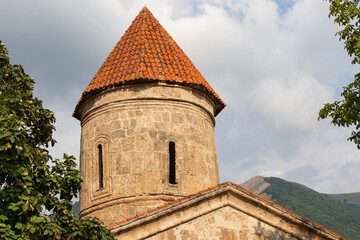 Fototapeta premium Ancient religious buildings in the Caucasus. Old christian temple in the Kish village of Sheki - Azerbaijan
