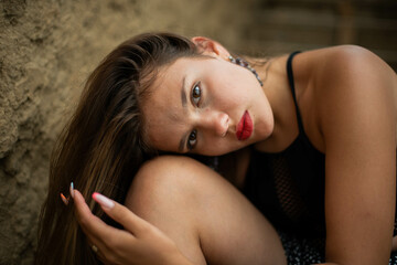 cheerful young girl spending good time at the beach. Beauty portrait. Сute teenage girl or woman on the beach nature landscape fresh air beach. Natural beauty. lifestyle/ real people/ funny/ dance.