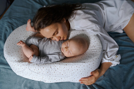 mother and child in a cocoon mattress