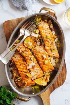 Top view of pan with grilled salmon 