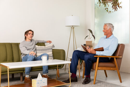 Psychotherapist Takes Notes During Session Notes During Client S