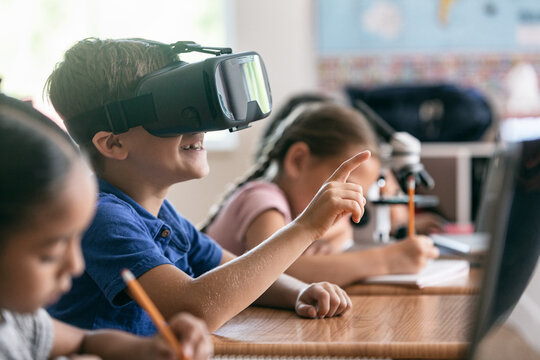 School: Boy Uses VR Headset In Classroom