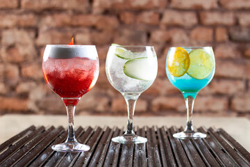 red, blue, white drink with ice
classic cocktail glasses
drink in the club
caipirinha, negroni cold...