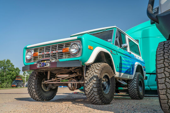 Loveland, CO, USA - August 29, 2021: Vintage, first generation,  Ford Bronco ranger wagon with an upgraded front bumper and winch promoting Falken Tires during Overland Expo Mountain West event. This 