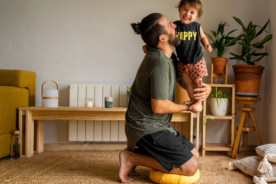 Family father enjoying his fatherhood at home