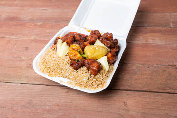 Chinese food delivery. chicken with spicy pineapple and fried rice