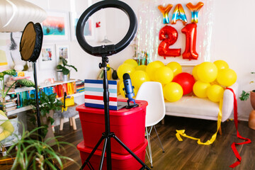 Creative studio decorated for online graduation ceremony