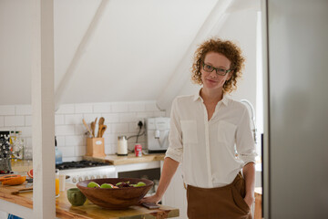 Woman smiling in kitchen