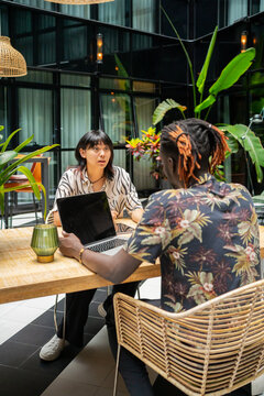 Colleagues Having An Interview In A Office Workplace. 