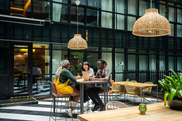 Wide View Of Entrepeneurs At Work In A Modern Office. 