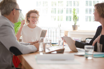 Office workers having meeting at desk