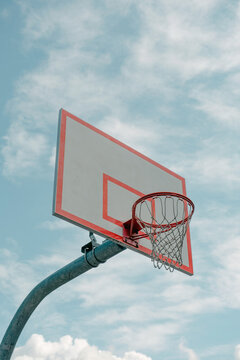 Basketball hoop and sky. 