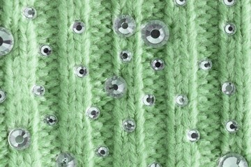 Knitting stitches and rhinestones background GREEN