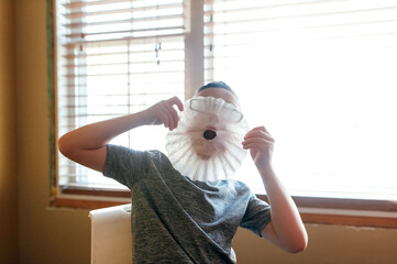 Child being goofy for the camera. 