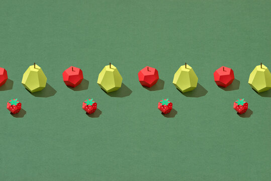 top view of handmade colorful origami fruits on
