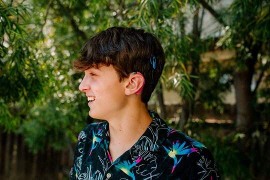 Teen boy with Cochlear implants