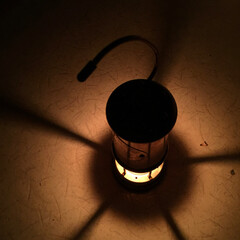 burning lamp on a table