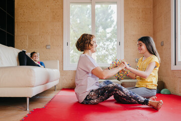 Family doing breathing exercises together