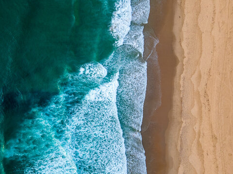 Aerial view of a sandy beach from above
