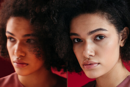 Portrait of beautiful young mixed race woman.