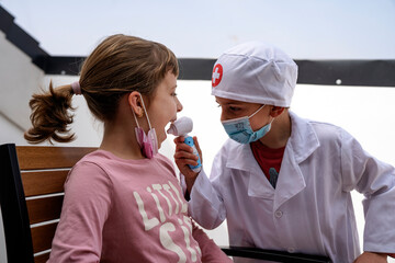 Little brothers playing doctor.