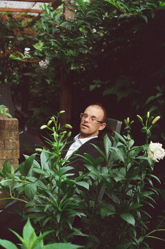 Man with down syndrome in garden.