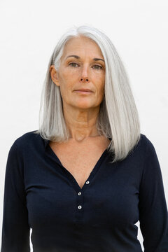 Portrait of beautiful mature woman looking at camera 