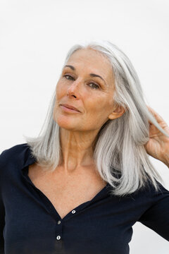 Portrait of  beautiful mature woman posing to camera