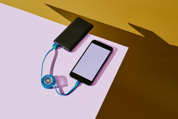 smartphone connected to a power bank