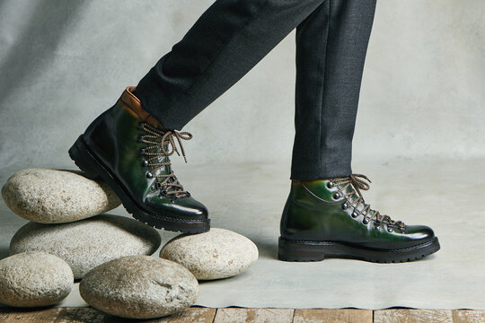 Mens boots on a gray background 