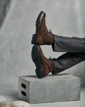 Mens boots on a gray background 
